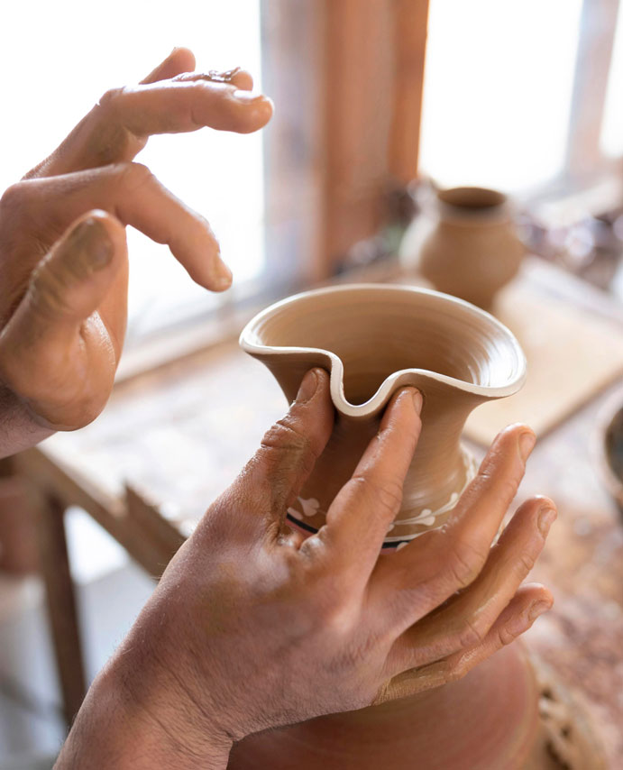 person-working-pottery-workshop-2