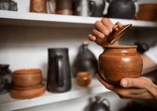 side-view-hands-holding-pot-1