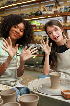 smiling-young-couple-pottery-workshop-business-owner-against-shop-background-2